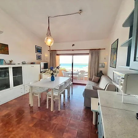 Aparthotel Isa-residence With Swimming Pool In Marinella Just 300 Mt From The Sea, With Sea View