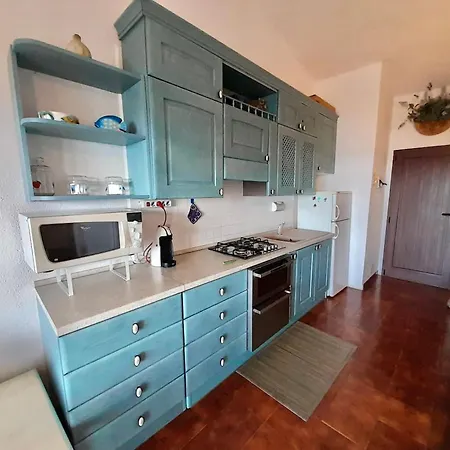 Aparthotel Isa-residence With Swimming Pool In Marinella Just 300 Mt From The Sea, With Sea View